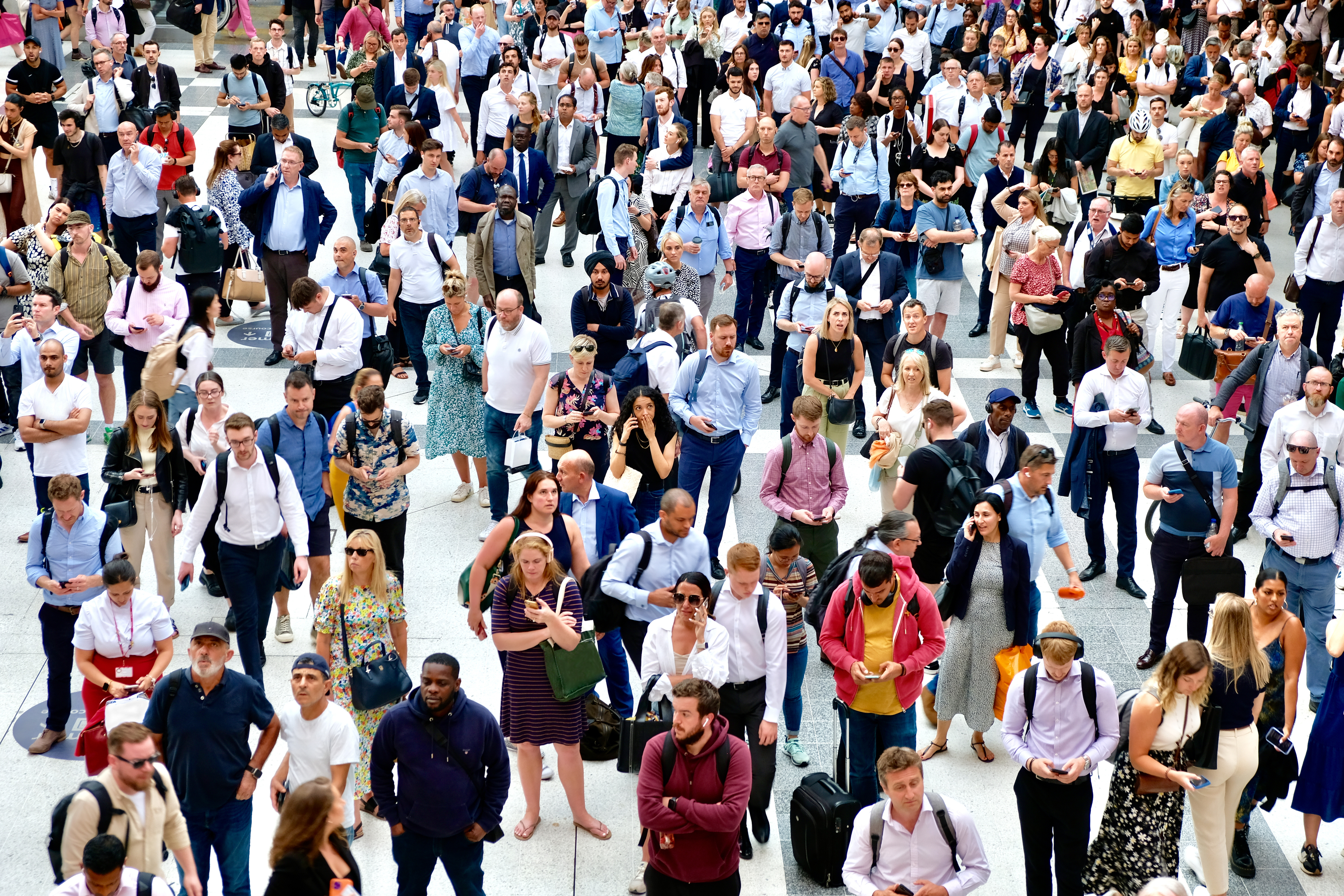 Crowd of people wiating for a train